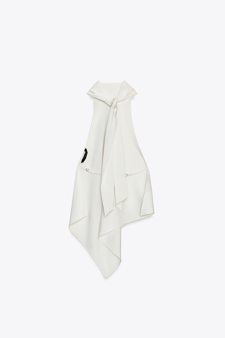 White hooded garment on a white background