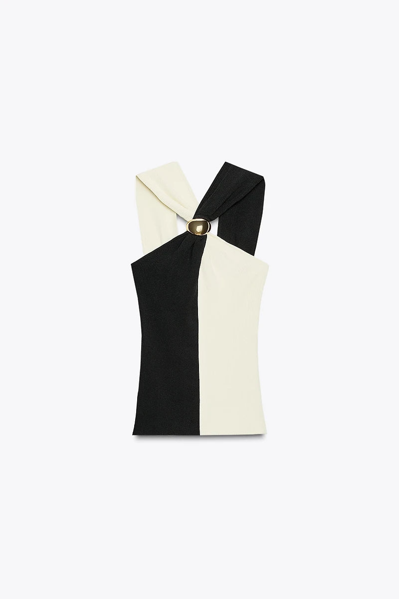 Black And white top clipped with mettle 