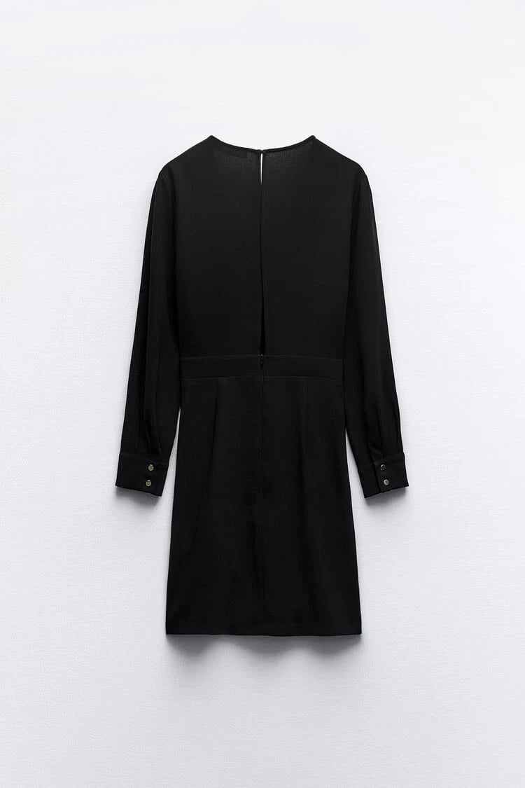 Black dress with long sleeves on a white background